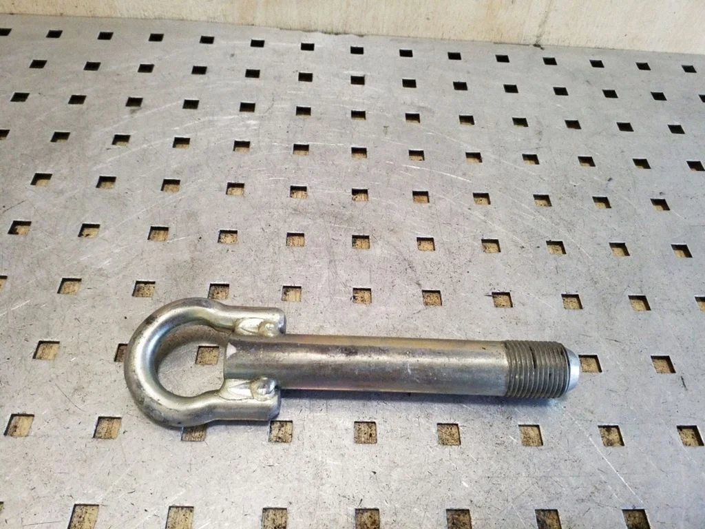 Towing hook eye