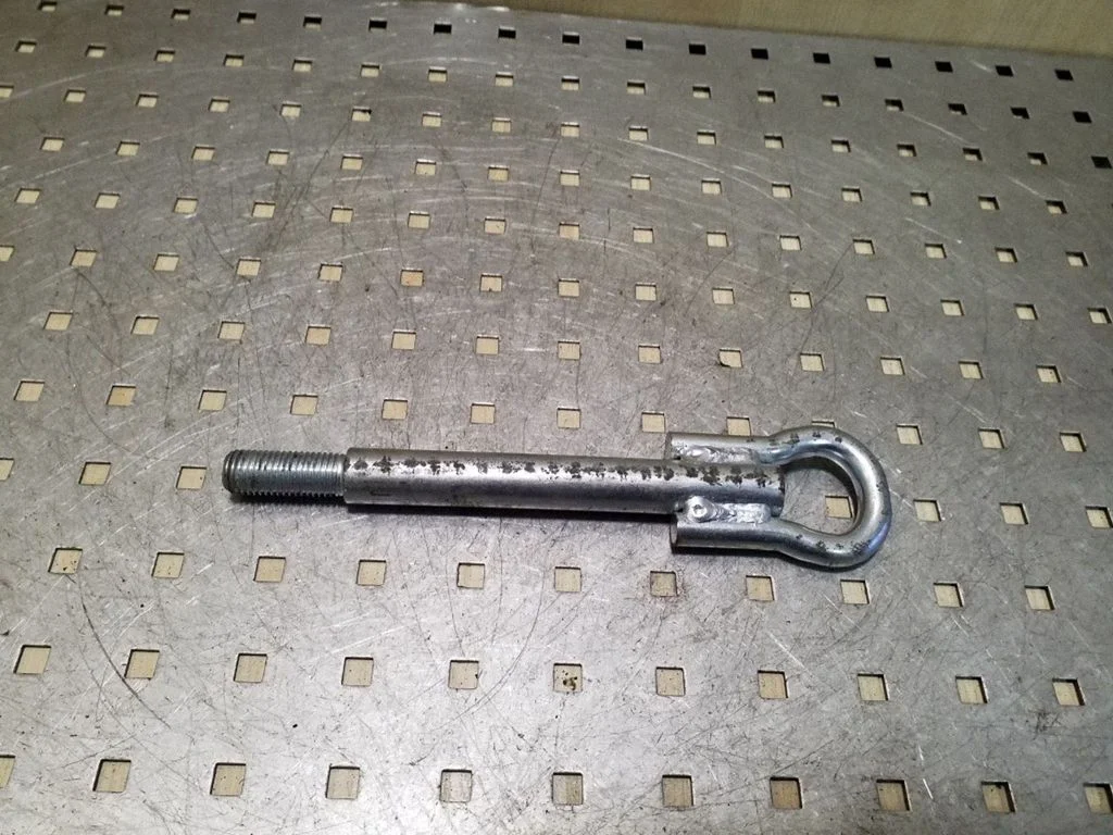 Towing hook eye