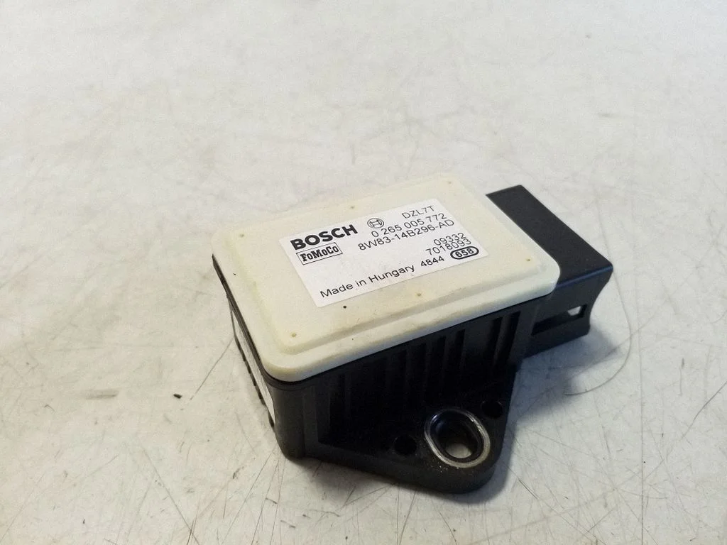 ESP (stabilitātes sistēmas) sensors (paātrinājuma sensors) – Jaguar XJ X351 (2009-2019)