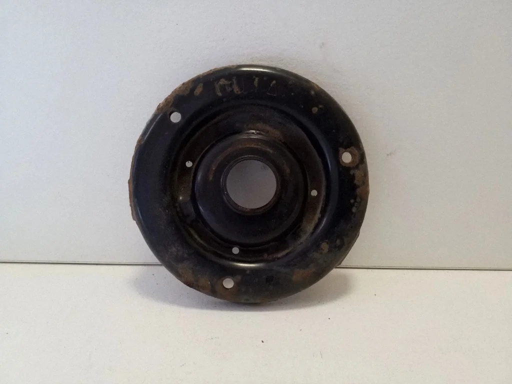 Coil spring mount – right