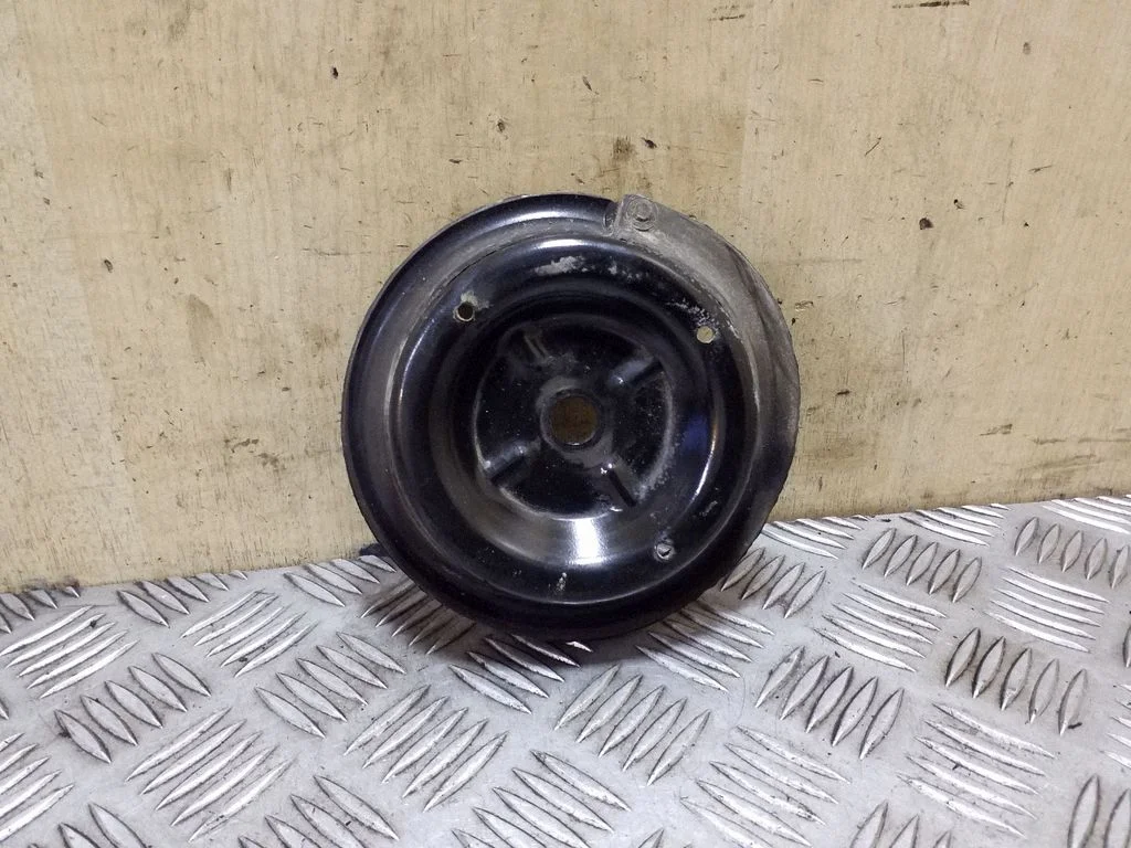 Coil spring mount – left