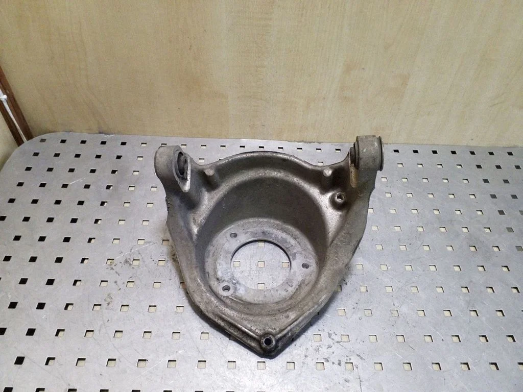 Coil spring mount – left