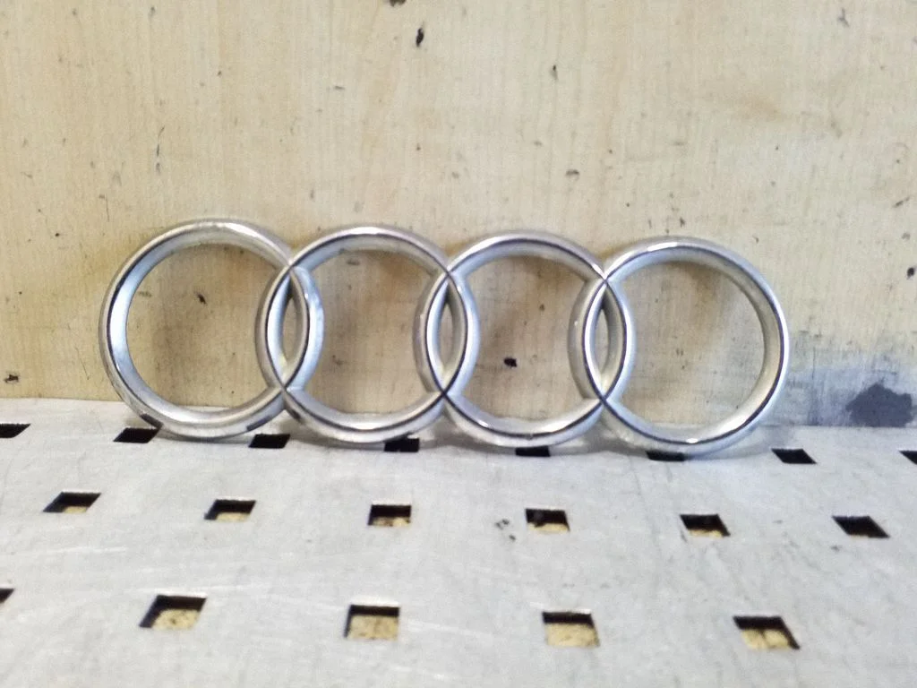 Manufacturers badge/model letters