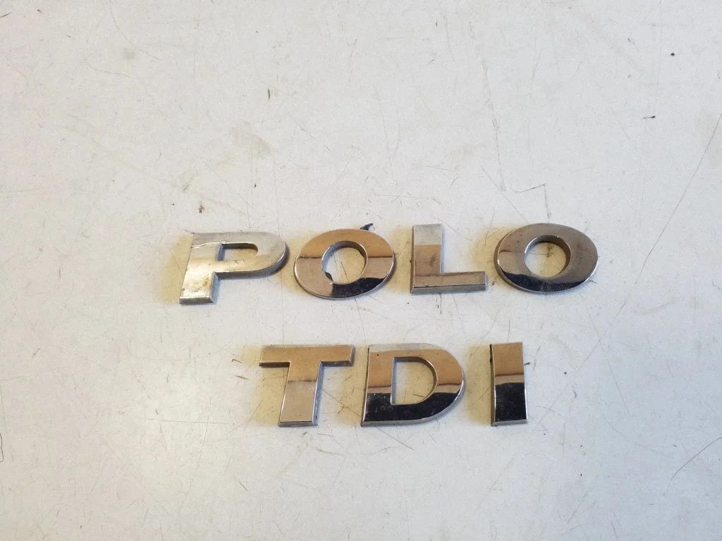 Gamintojo ženkliukas/ modelio raidės