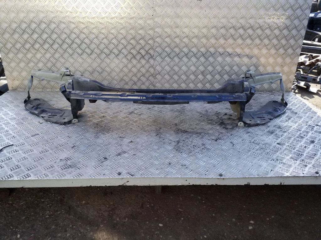 Top upper radiator support slam panel