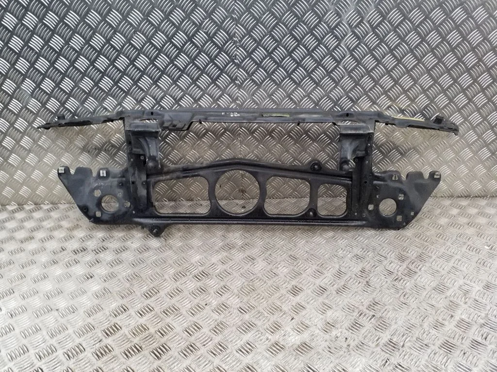 Top upper radiator support slam panel