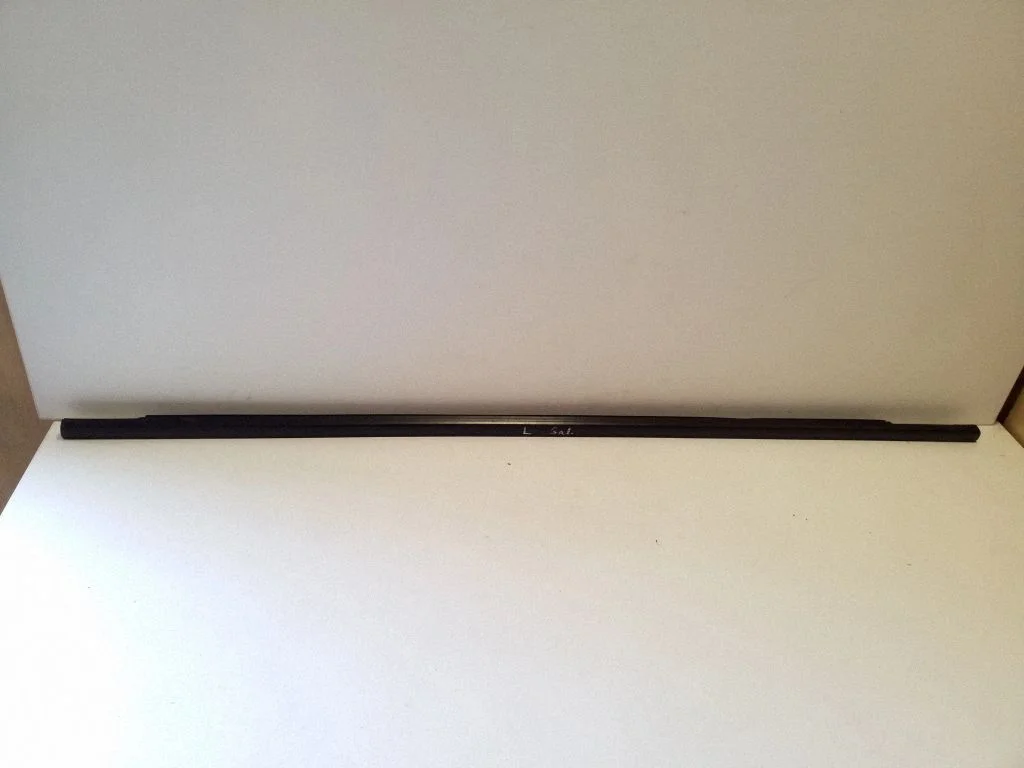 Rear door glass trim molding – left