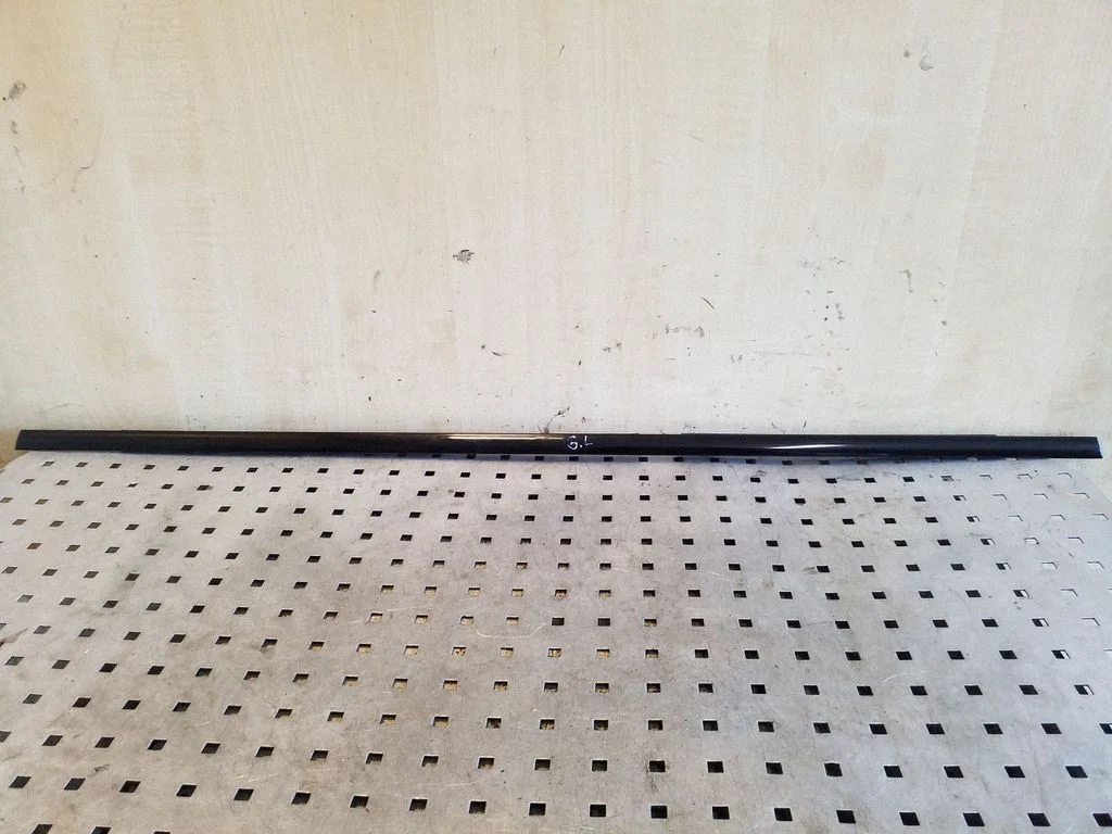 Rear door glass trim molding – left