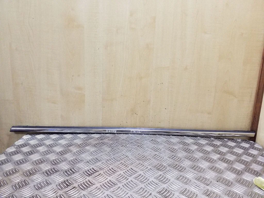 Front door glass trim molding – left