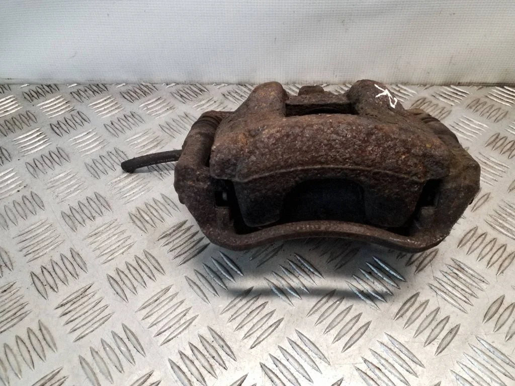 Front brake caliper – right