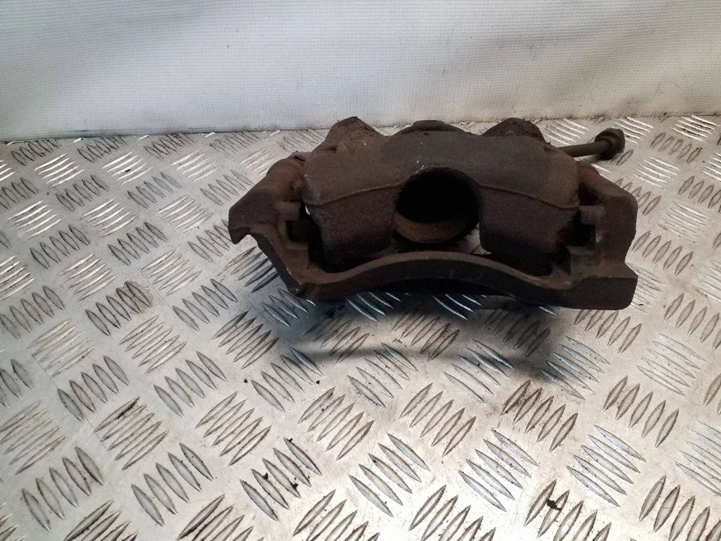 Front brake caliper – left