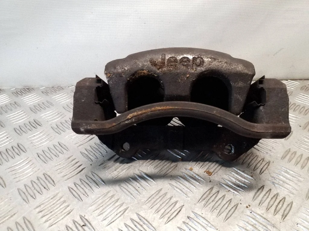 Front brake caliper – right