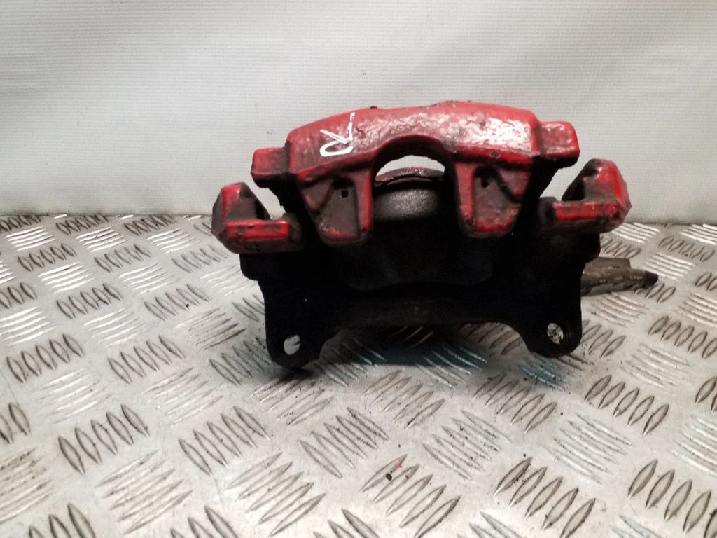 Front brake caliper – right