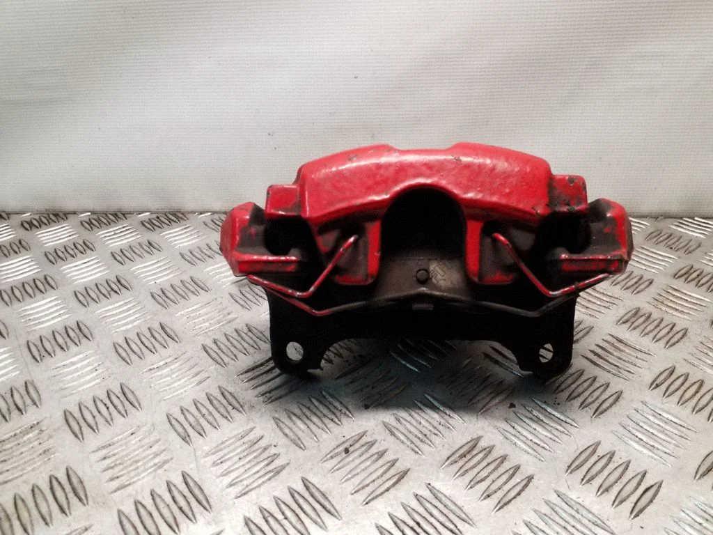 Front brake caliper – left
