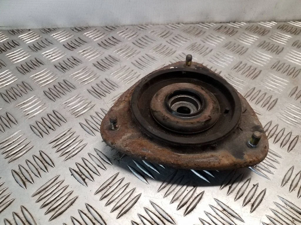 Front upper strut mount – left