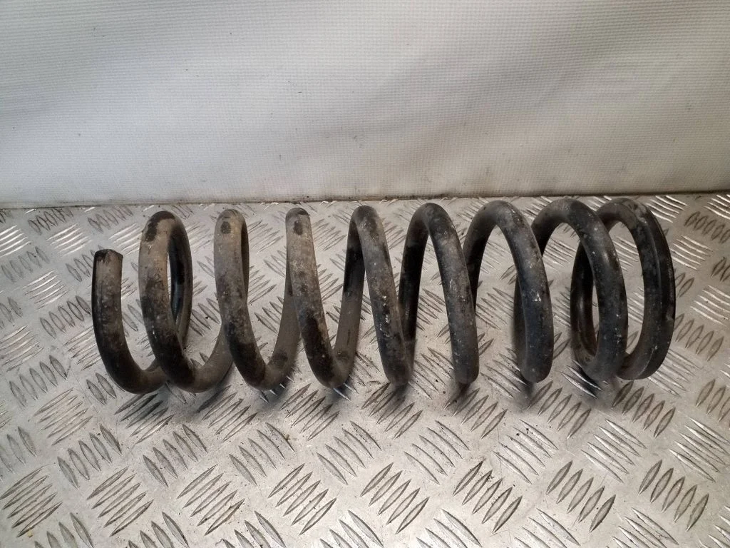 Front coil spring – left