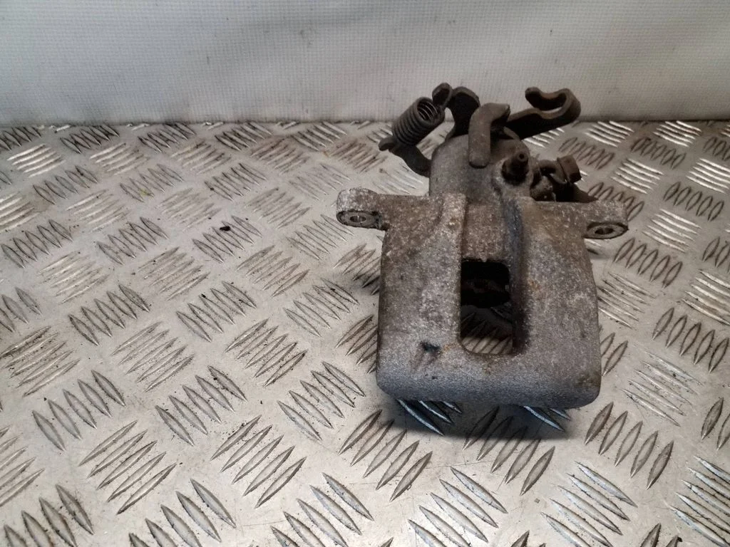 Rear brake caliper – right