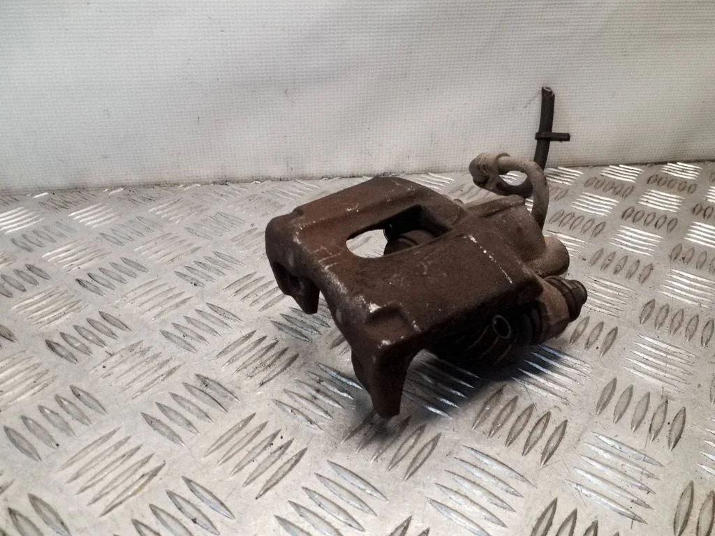 Rear brake caliper – right