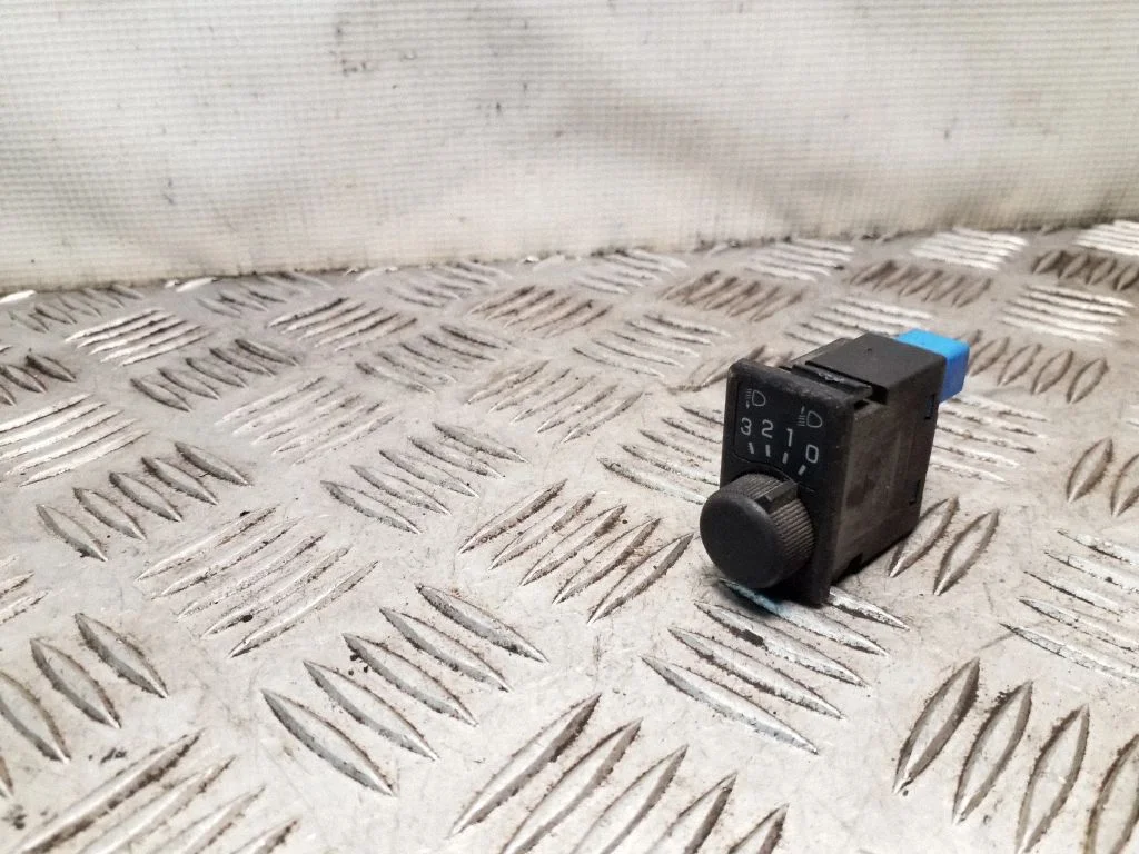 Headlight level height control switch