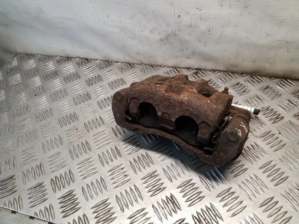 Front brake caliper – right