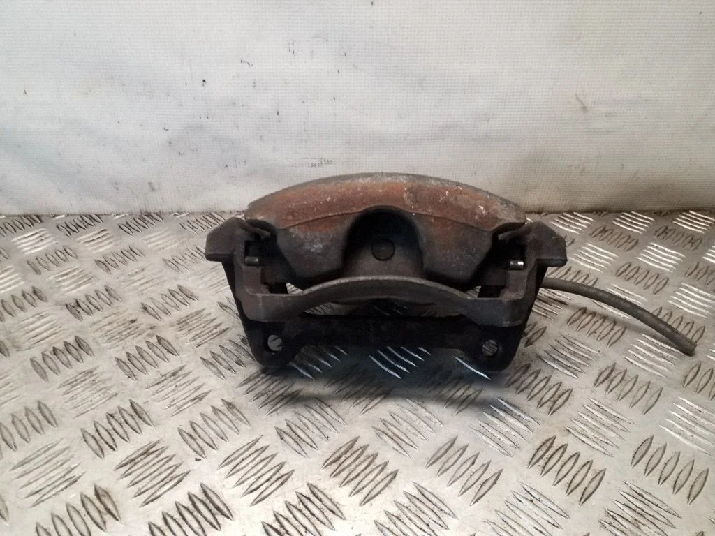 Front brake caliper – left