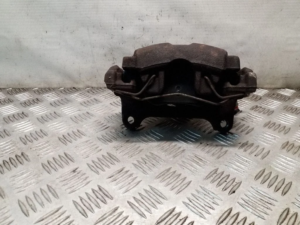 Front brake caliper – left