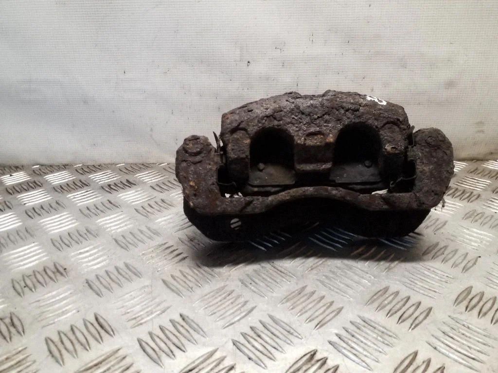 Front brake caliper – right