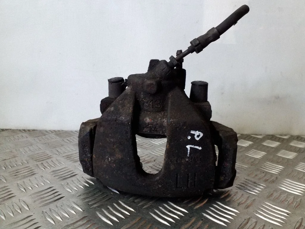 Front brake caliper – left