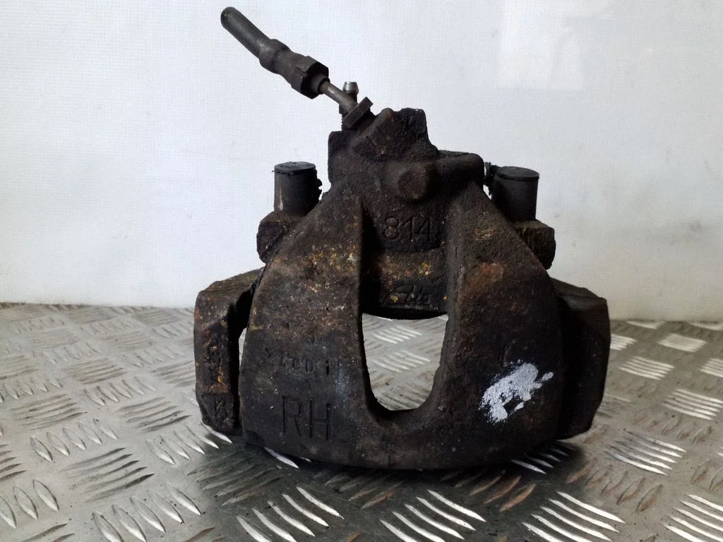 Front brake caliper – right