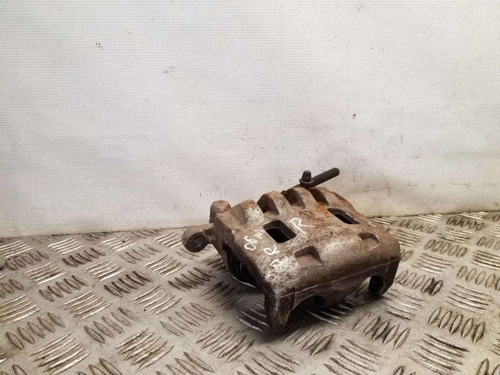 Front brake caliper – front right