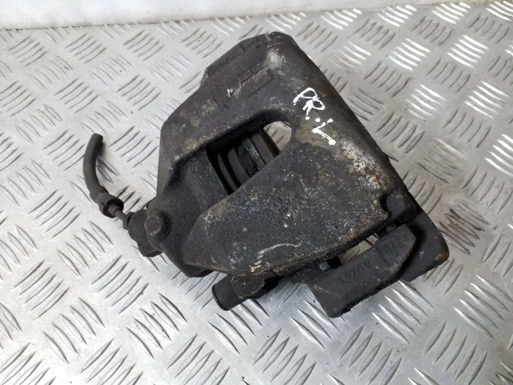 Front brake caliper – left