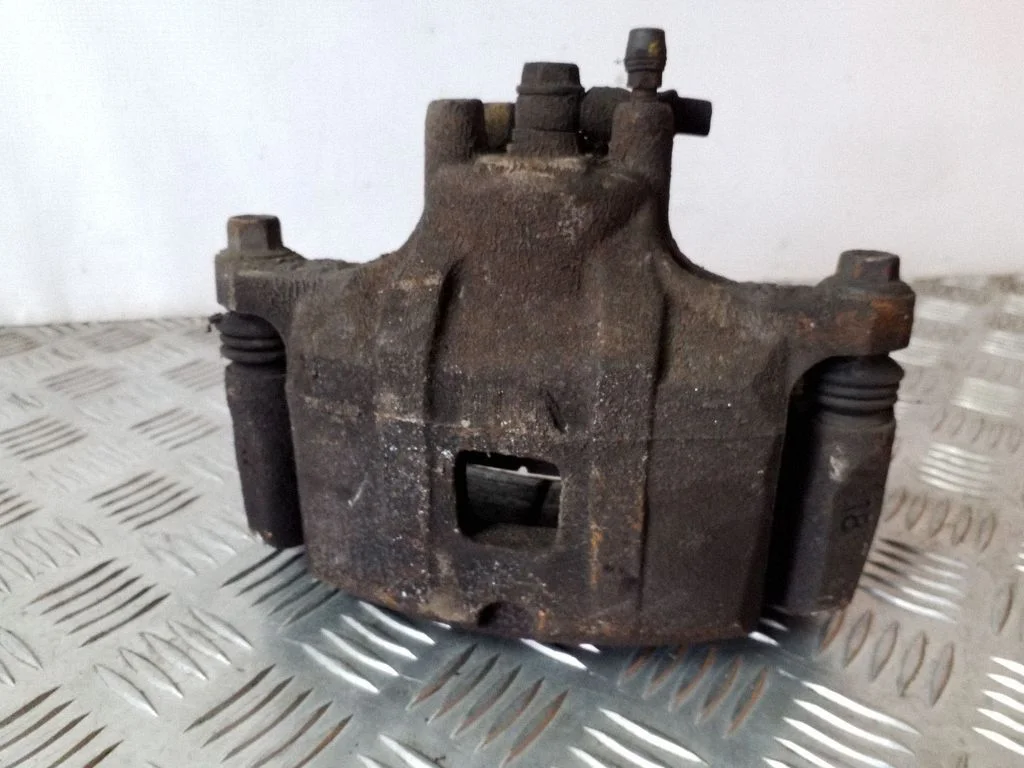 Front brake caliper – left