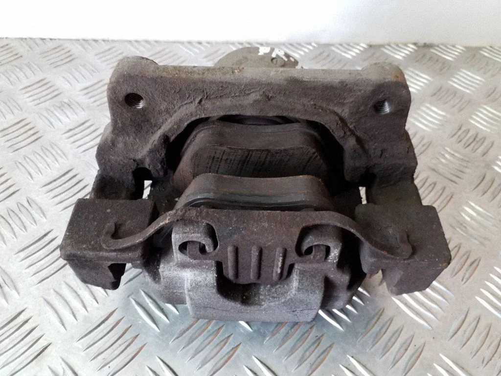 Front brake caliper 6024330