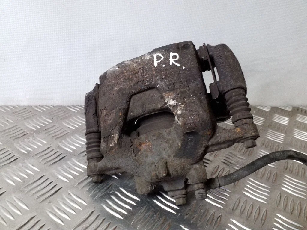 Front brake caliper – right