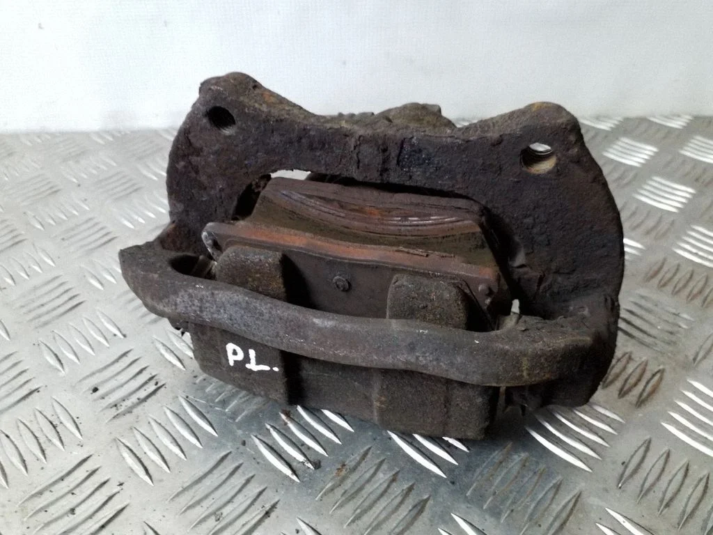 Front brake caliper – left