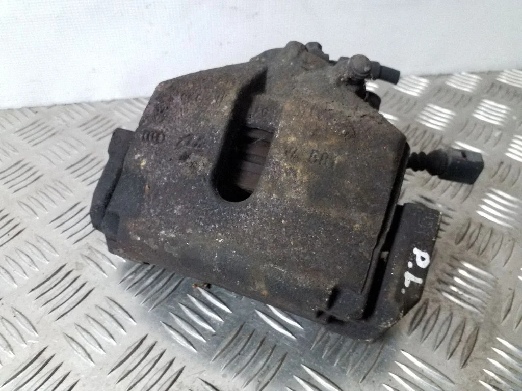 Front brake caliper – left