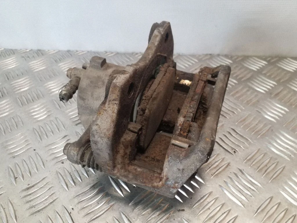 Front brake caliper – left