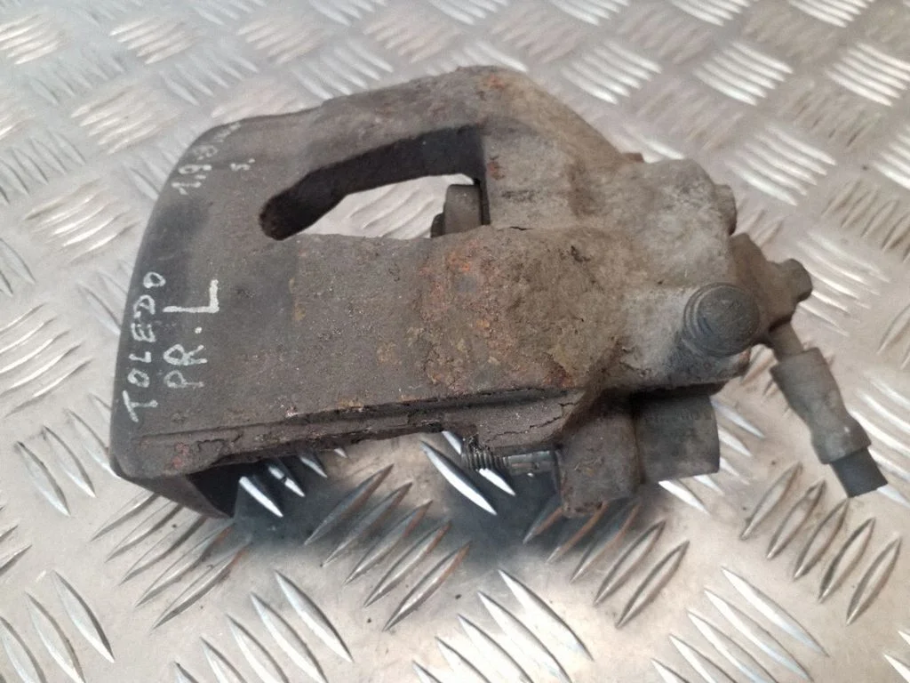 Front brake caliper – left