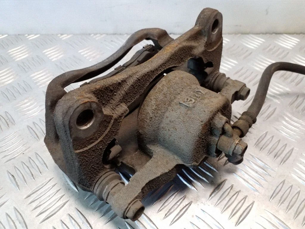 Front brake caliper – left