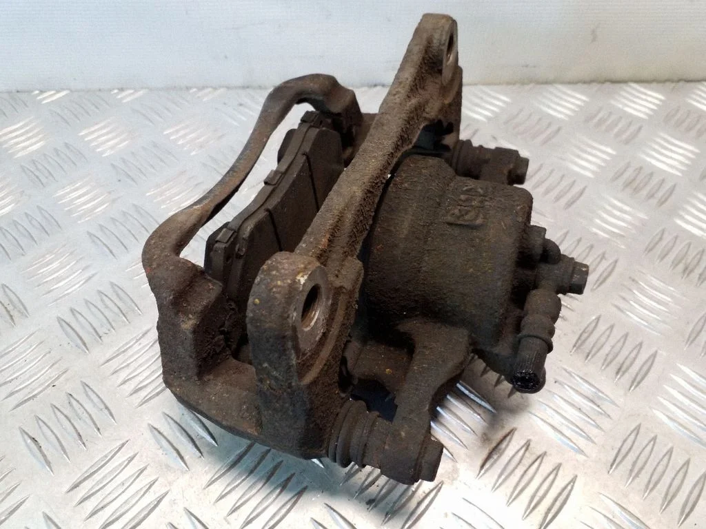 Front brake caliper – right