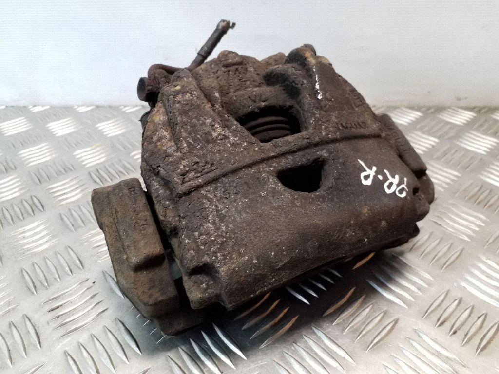 Front brake caliper – right