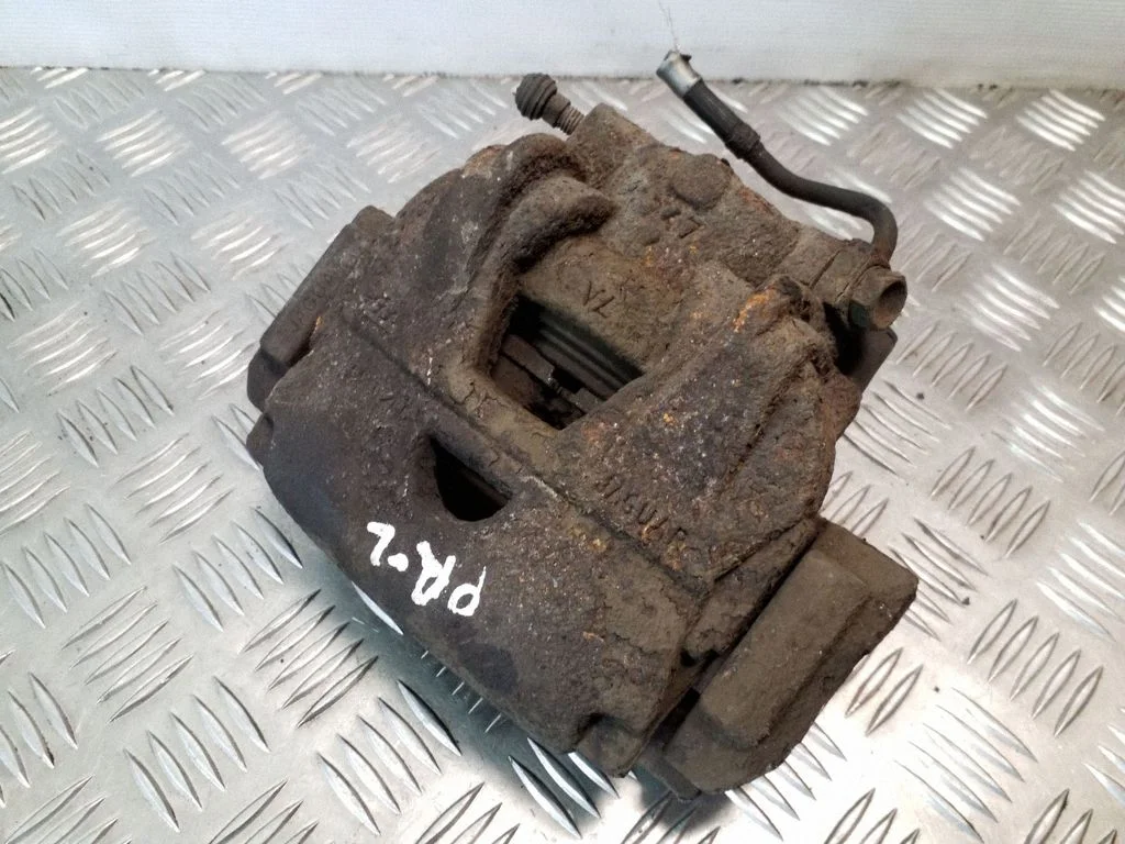 Front brake caliper – left