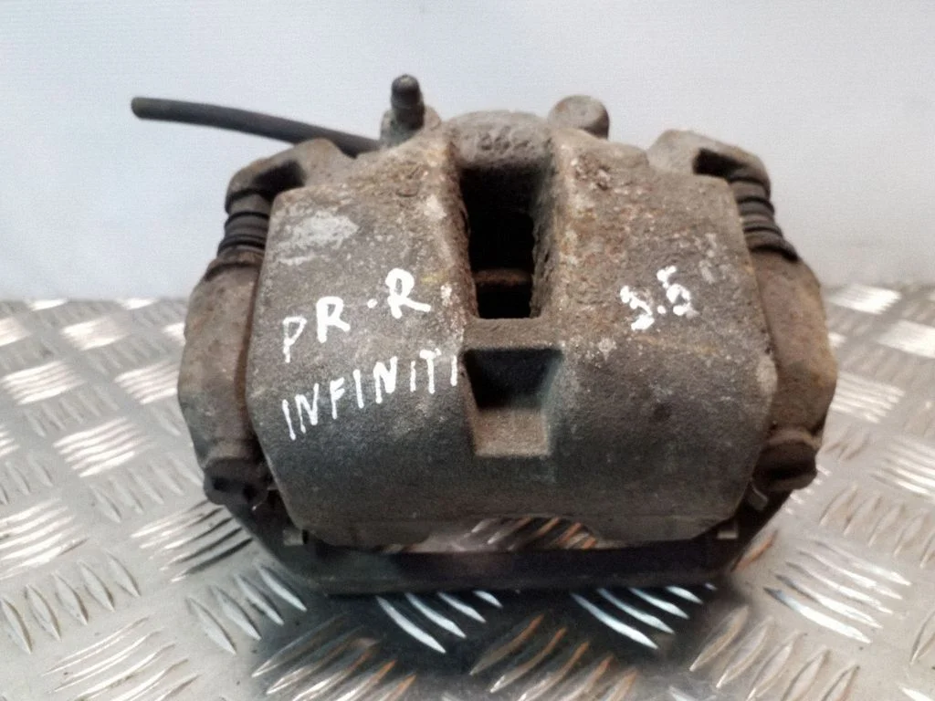 Front brake caliper – right