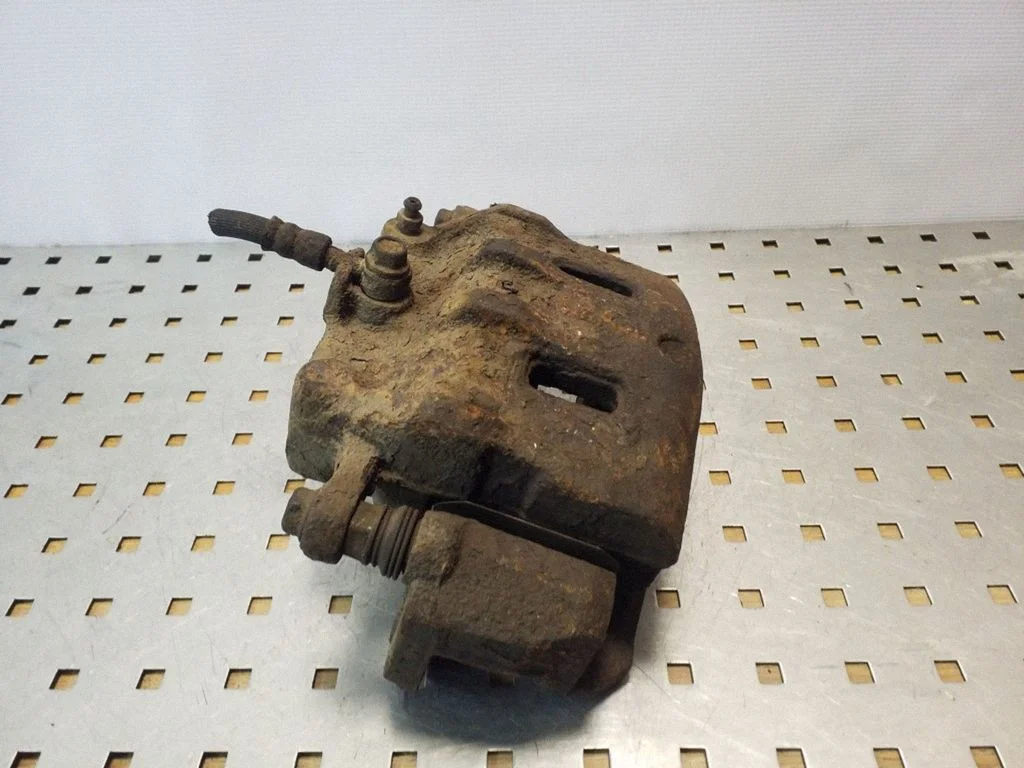 Front brake caliper – front left
