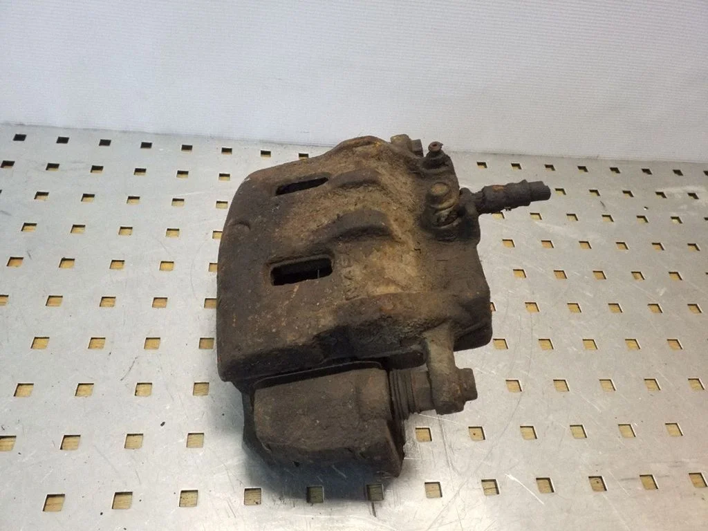 Front brake caliper – front right