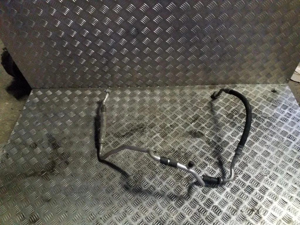 Air conditioning (A/C) pipe/hose 1K0820743FD