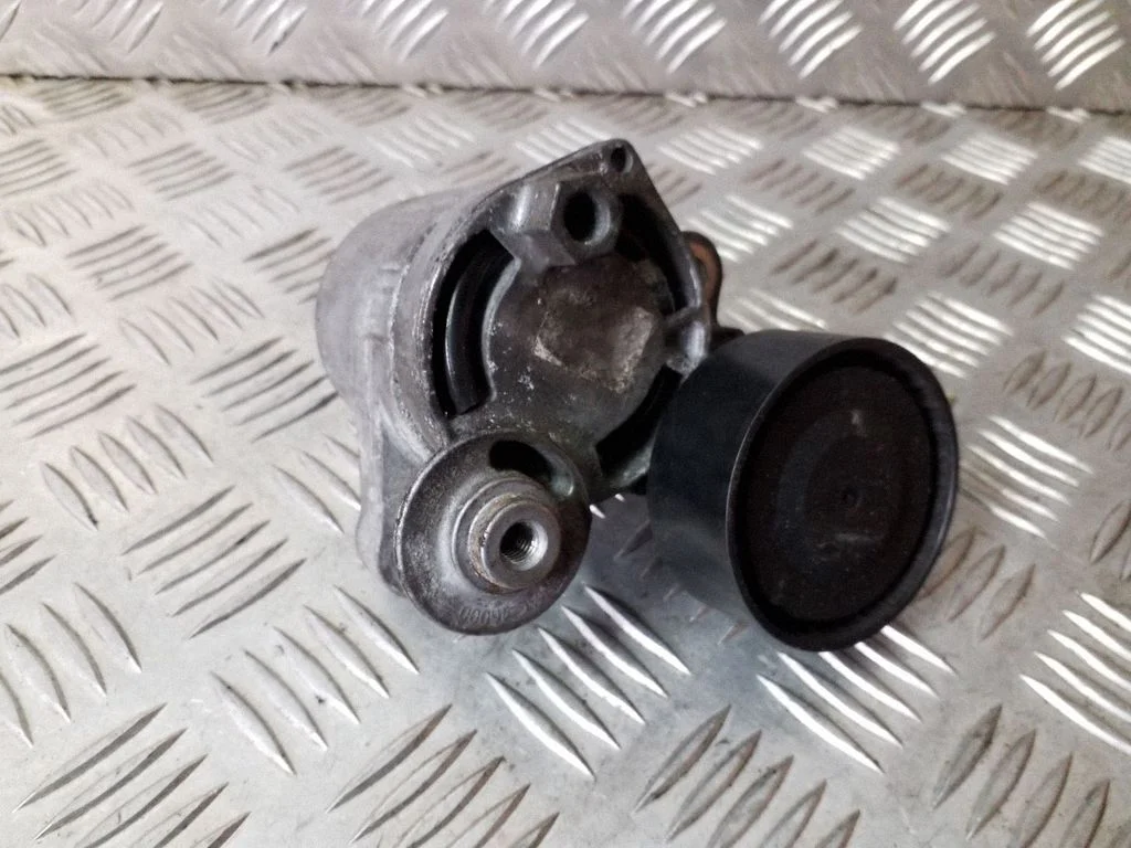 Generator/alternator belt tensioner