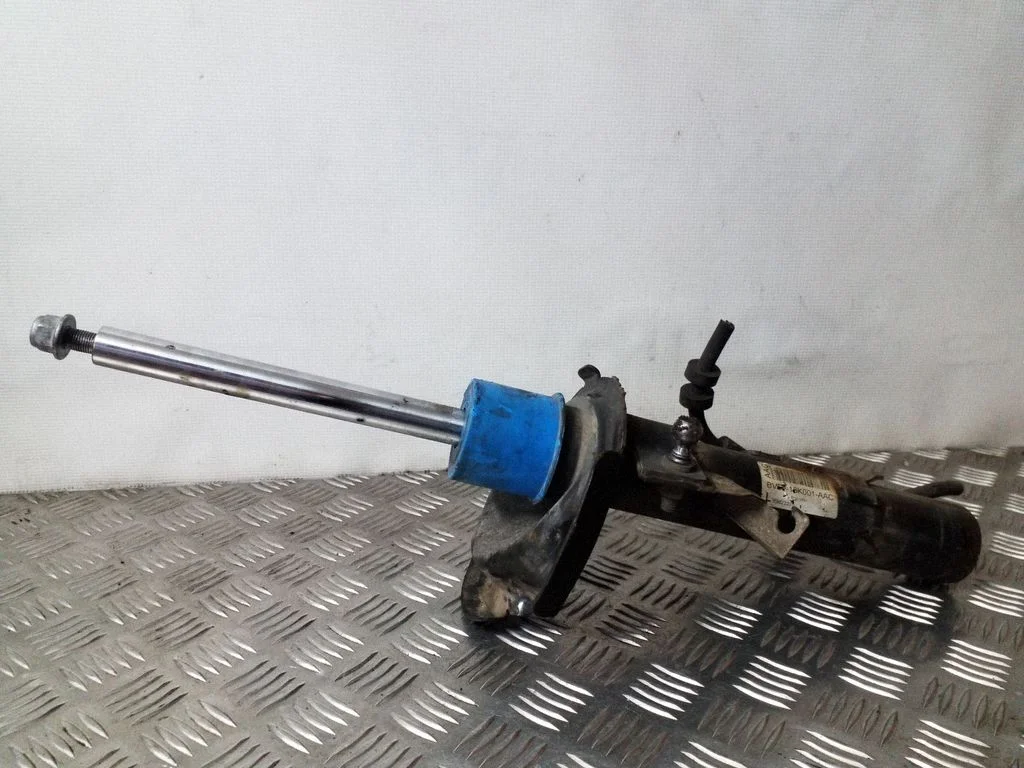 Front shock absorber/damper – left