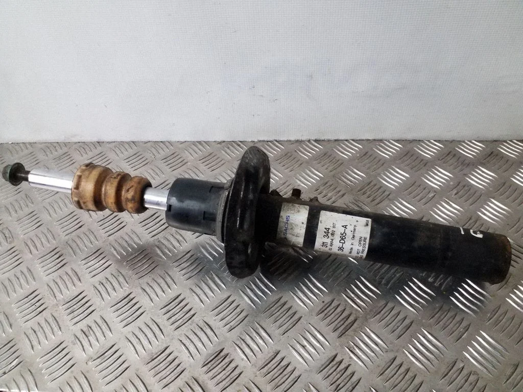 Front shock absorber/damper – left