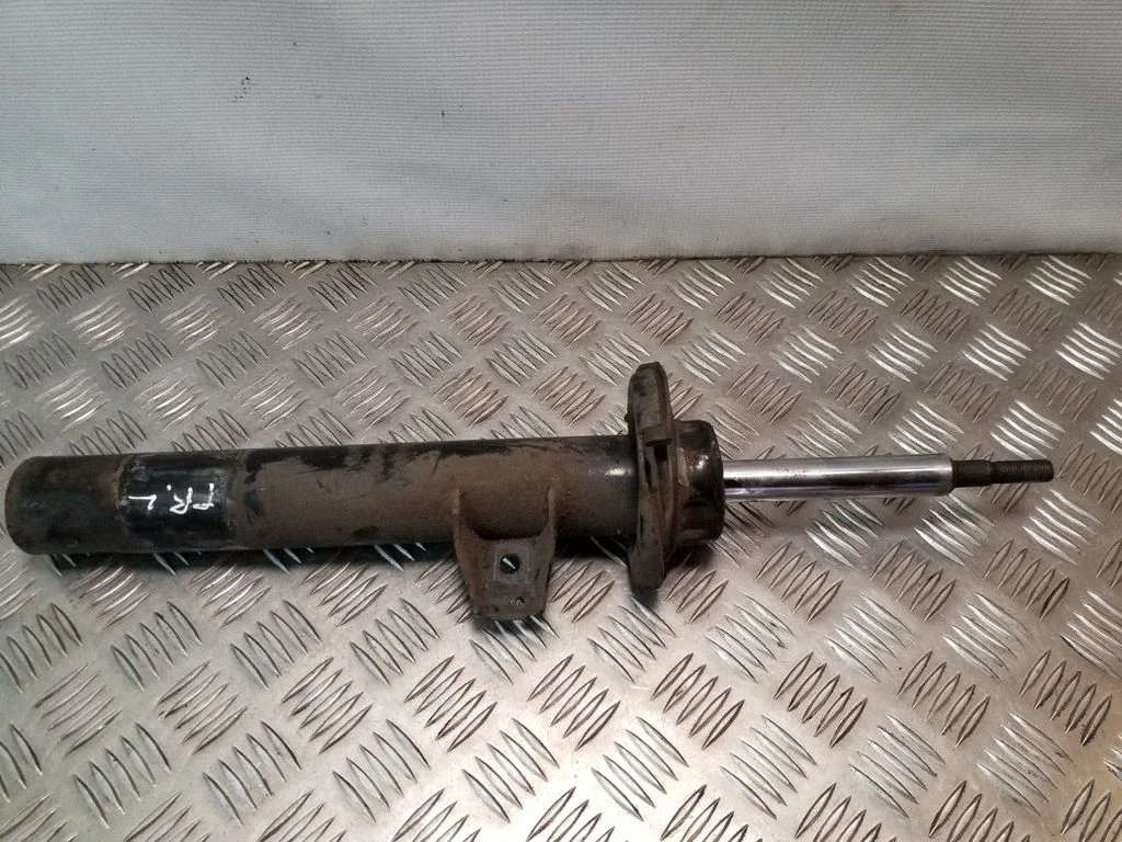 Front shock absorber/damper – left